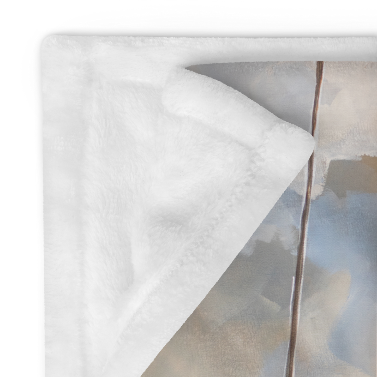 Close-up of a white pillow with a blurred abstract painting in the background