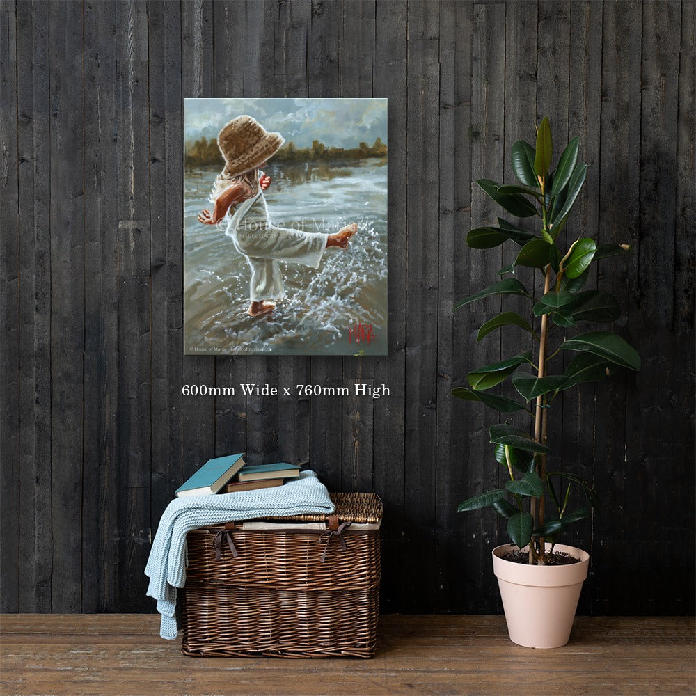 Lost in the Moment — a little girl in a straw hat splashing barefoot in the water by Maria Magdalena Oosthuizen, 600 x 760mm original shown on a dark wood wall | original art for the home | House of Maria