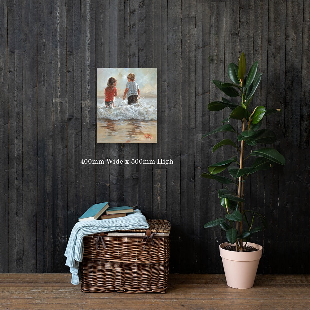 Into the Waves — two children running into the ocean waves by Maria Magdalena Oosthuizen, 400 x 500mm canvas print on a dark wood wall | canvas print wall art | House of Maria
