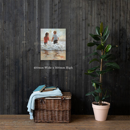 Into the Waves — two children running into the ocean waves by Maria Magdalena Oosthuizen, 400 x 500mm canvas print on a dark wood wall | canvas print wall art | House of Maria