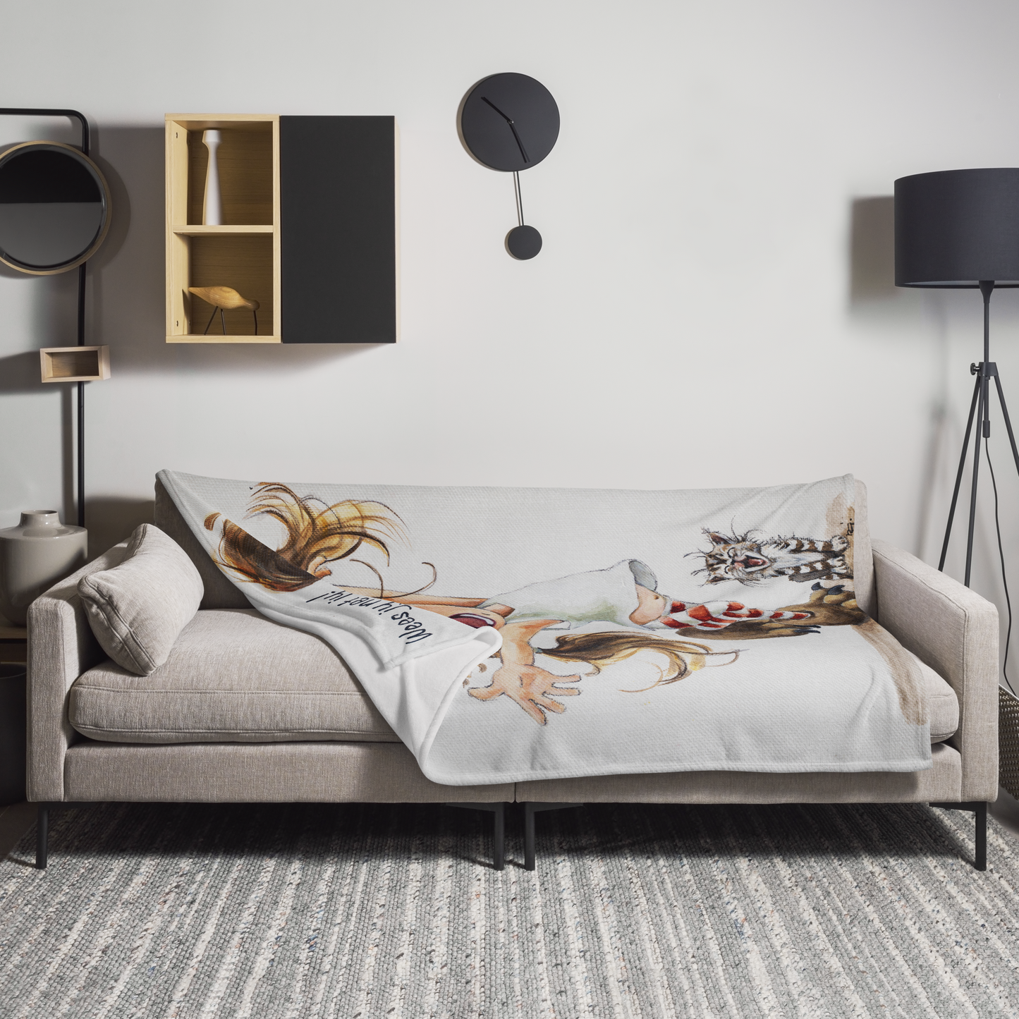 Beige sofa with decorative pillows and a blanket in a modern living room setting. Maria - House of Maria