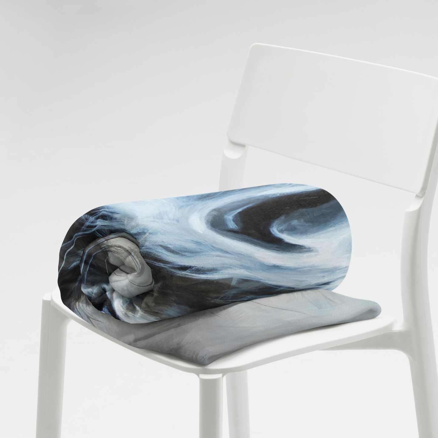 Marble-patterned seat cushion on a white chair