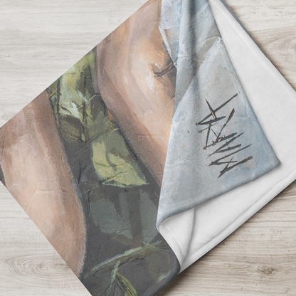 Red Roses — lifestyle shot of fleece blanket draped over couch by Maria Magdalena Oosthuizen | warm art gift for her South Africa | House of Maria