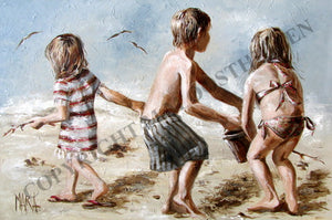 Three children playing on the beach